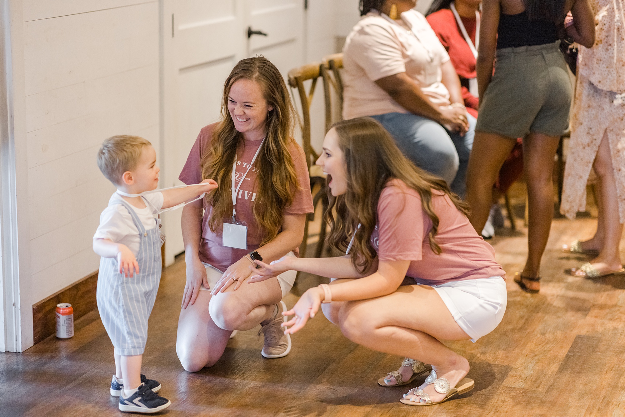 guests meet toddler during Creative at Heart Round 10